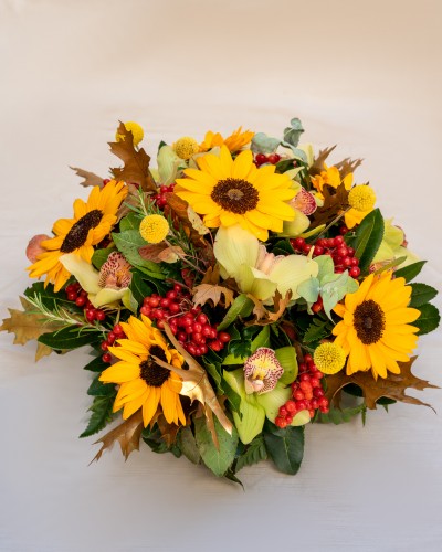 Arrangement of Sunflowers, Cymbidium and Fall Leaves in Handmade Ceramic Pot