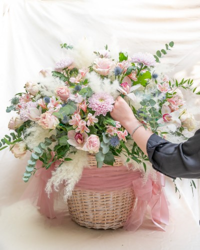 Arrangement of Roses, Alstroemerias, Chrysanthemums, Eucalyptus and Pampas in Wooden Basket